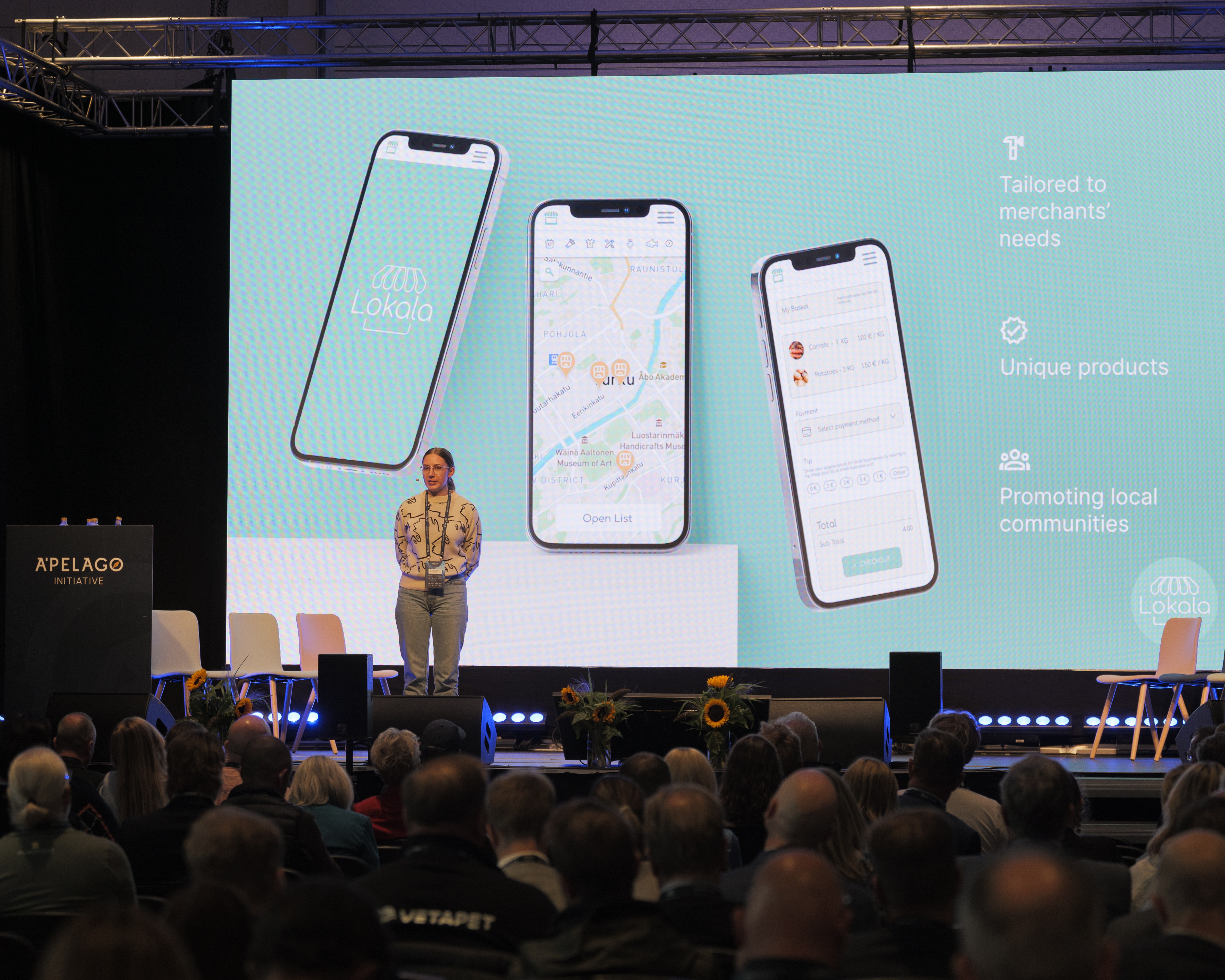 Image of Hanna standing on stage