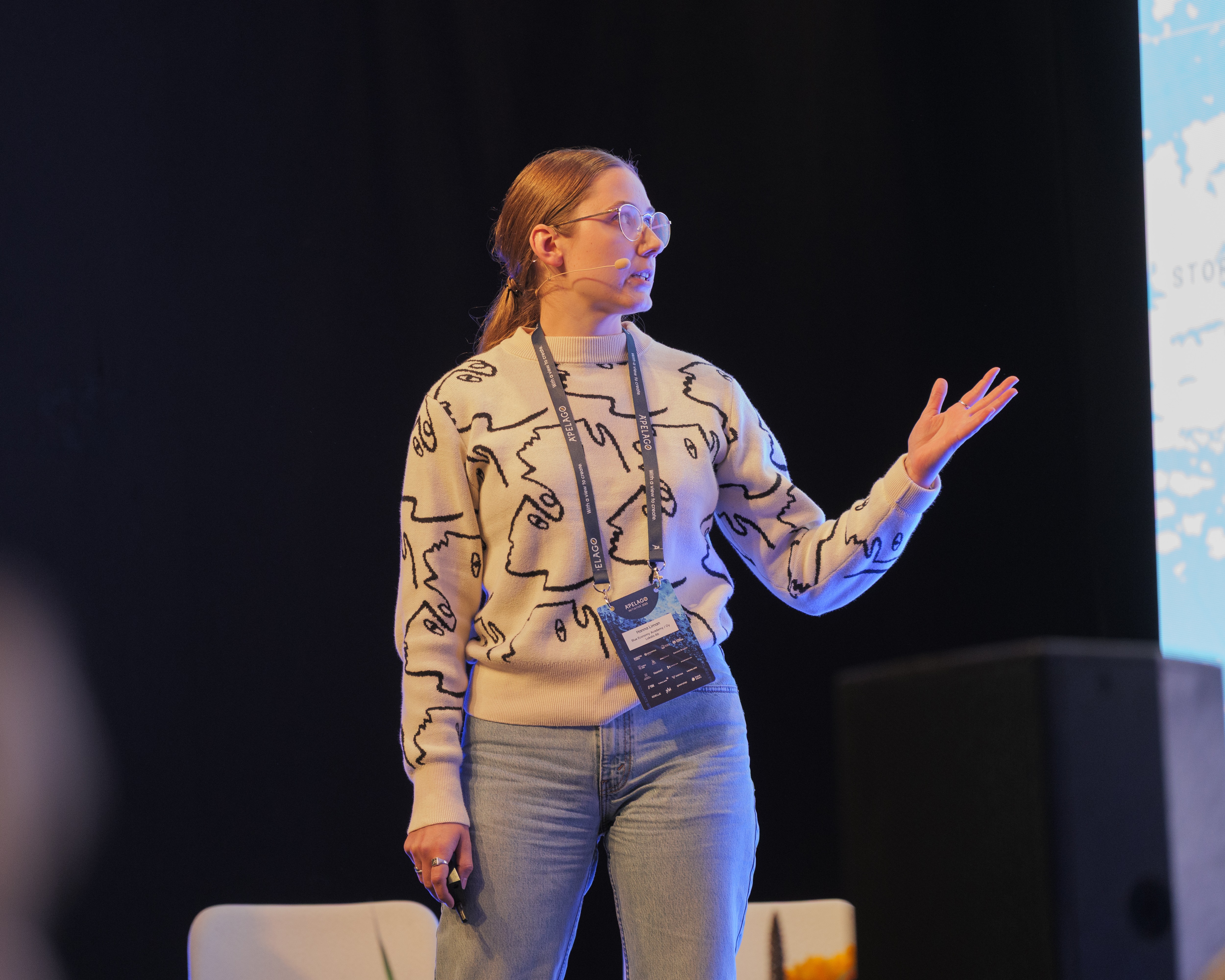 Image of Hanna standing on stage