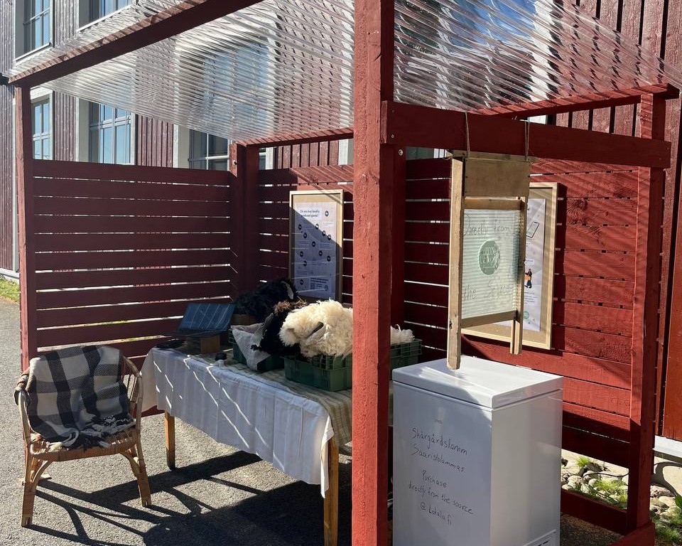 Image of red painted market stand